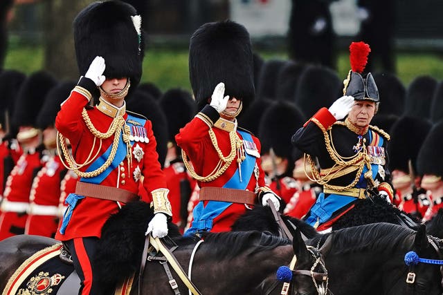 The Prince of Wales, the Duke of Edinburgh and the Princess Royal salute 