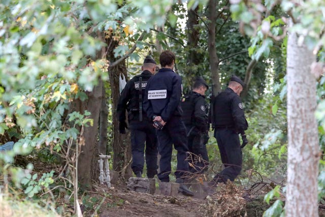 Police clear a migrant camp near Calais