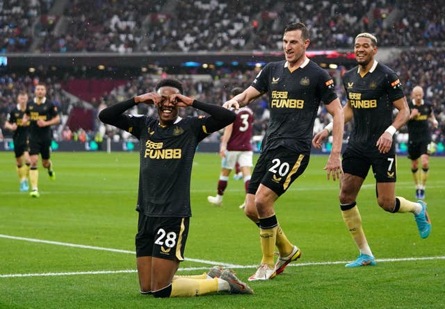 Joe Willock, left, celebrates the equaliser 