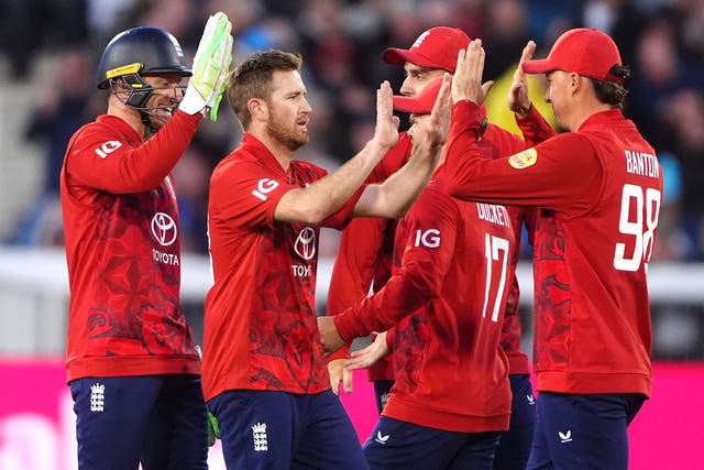 England’s Ben Duckett (second right) celebrate catching out West Indies’ Roston Chase