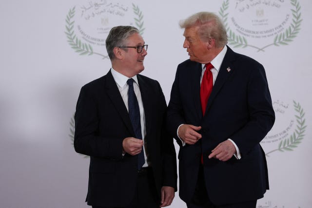 Sir Keir Starmer, left, and Donald Trump sharing a joke with each other