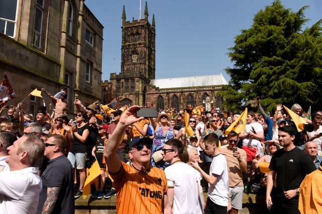 Wolverhampton Wanderers fans soaked up the sun during their winner’s parade after topping the Championship (Joe Giddens/PA)