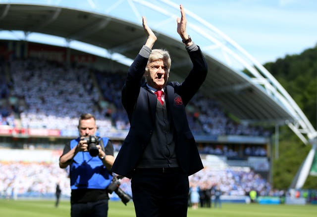 Wenger waved goodbye to Arsenal fans ahead of the game at Huddersfield.