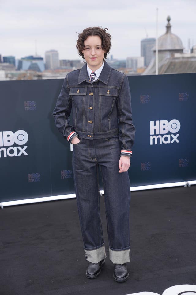 Bella Ramsey poses for photographs at the HBO Max pop-up experience