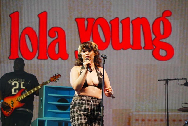 Lola Young performing at Glastonbury