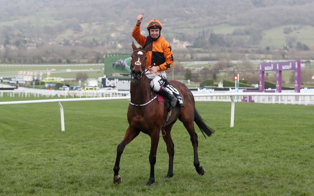 Aidan Coleman celebrates after winning the Betway Queen Mother Champion Chase on Put The Kettle On