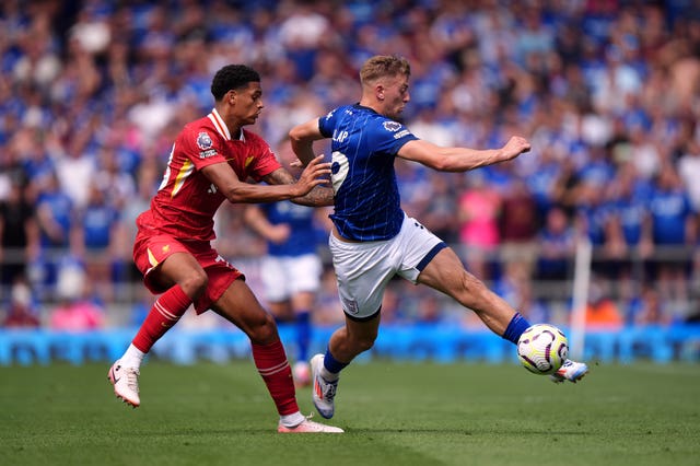 Ipswich’s Liam Delap, right, keeps the ball from Liverpool’s Jarell Quansah