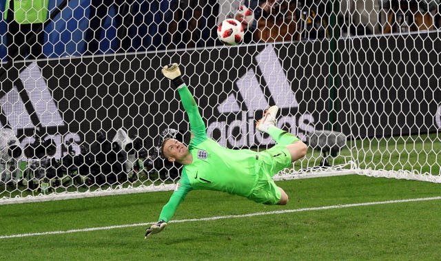 England also advanced into the quarter-finals via their first ever World Cup win on spot-kicks, beating Colombia 4-3 after a 1-1 draw, with Jordan Pickford making a superb save during the shoot-out to keep out Carlos Bacca's shot (Aaron Chown/PA).