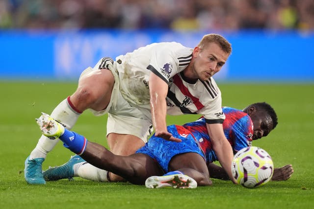 Matthijs de Ligt (left) and Crystal Palace’s Ismaila Sarr battle for the ball