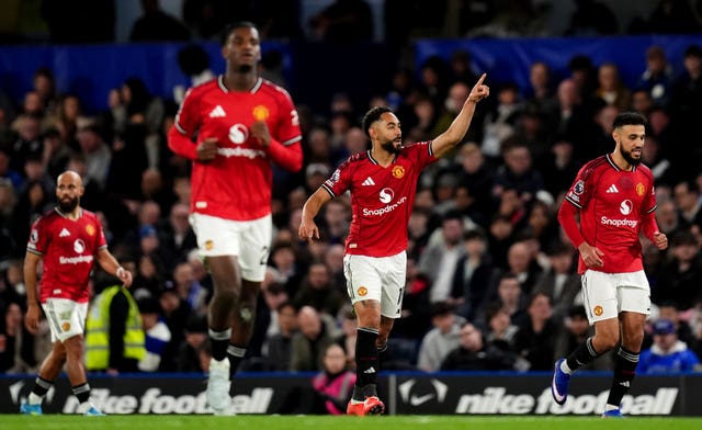 Matheus Cunha, second right, celebrates