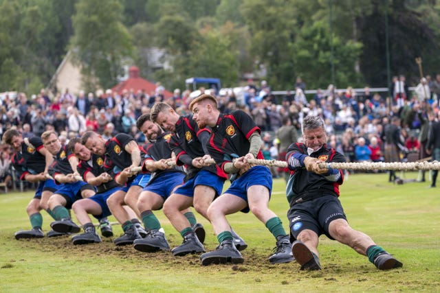 Tug-of-war competitors at the Braemar Royal Highland Gathering