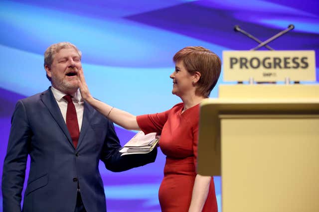 Angus Robertson and Nicola Sturgeon on stage at an SNP conference 