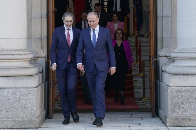 Taoiseach Micheal Martin, right, and Tanaiste Simon Harris 