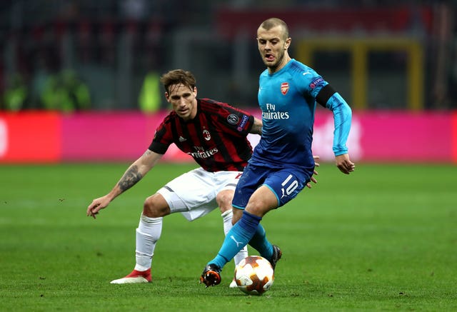 Jack Wilshere in action in the first-leg win over AC Milan (Tim Goode/Empics)