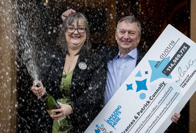 Lottery winner gives away half of �115m fortune