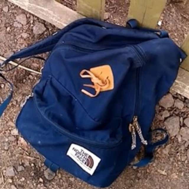 A navy blue The North Face bag which police are looking for in connection with the murder of Rita Lambourne