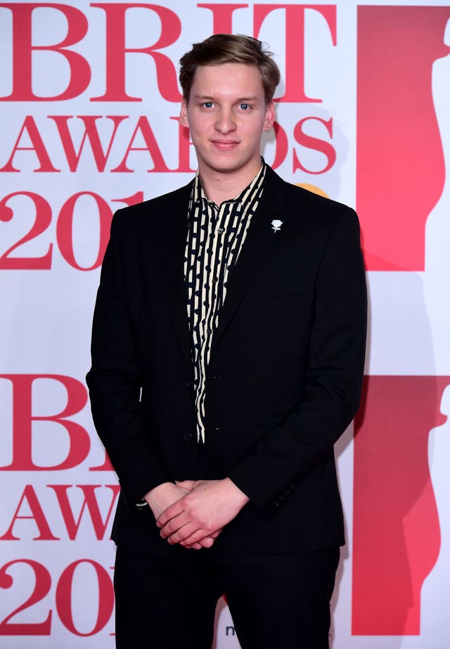 George Ezra arrives for the Brits (Ian West/PA)