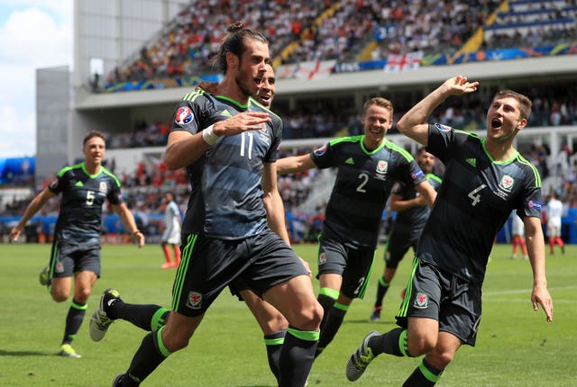 Gareth Bale, front, celebrates scoring against England at Euro 2016