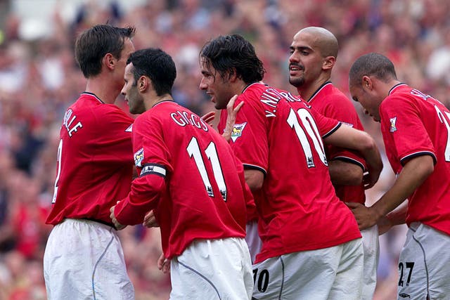 Ruud van Nistelrooy, centre, scored twice on his Premier League debut 