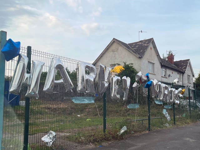 Tributes left for the two teenagers in Ely, Cardiff, whose death in a car crash sparked a riot