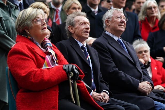 Diana Law, Denis Law, centre, and Sir Alex Ferguson during the unveiling