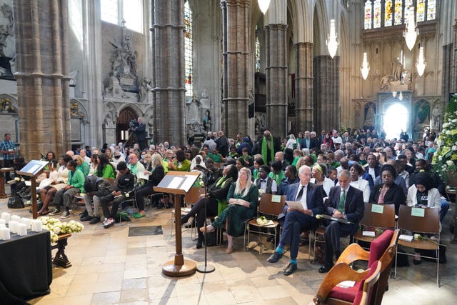 People arrive for a Grenfell fire memorial service at Westminster Abbey in London