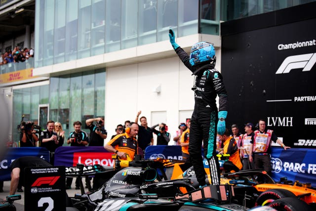 Russell celebrates pole