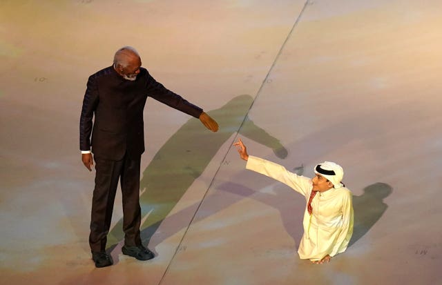 Morgan Freeman (left) and Ghanim Al-Muftah (right)