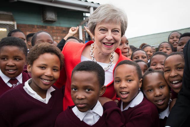 Theresa May and South African schoolchildren