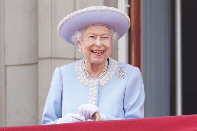 The Queen watches from the balcony during the Trooping the Colour ceremony at Horse Guards Parade