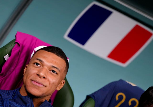 France’s Kylian Mbappe sits on the bench