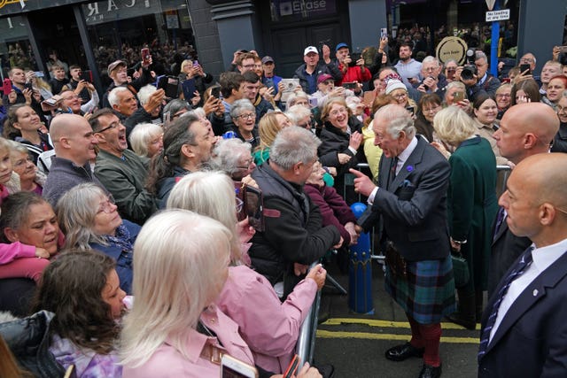 King Charles III greets members of the public as he arrives at an official council meeting at the City Chambers in Dunfermline, Fife, to formally mark the conferral of city status on the former town, ahead of a visit to Dunfermline Abbey to mark its 950th anniversary