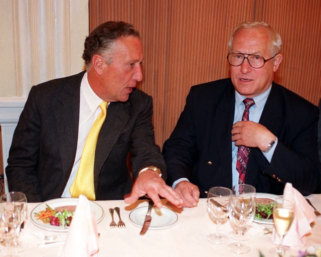 Author Frederick Forsyth (left) with Mr Gordievsky at a lunch in 1997