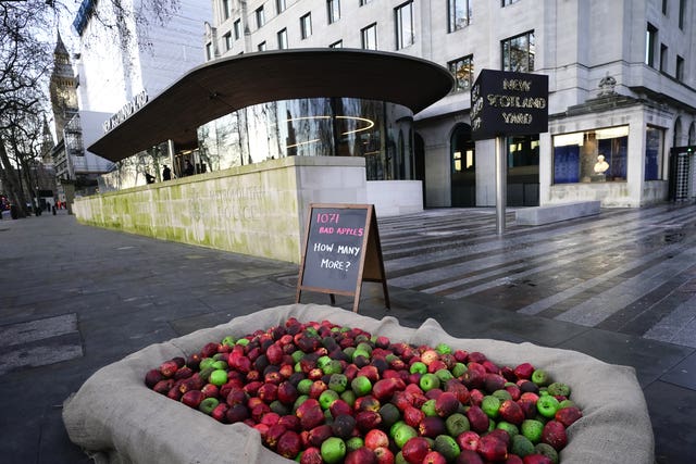 Rotten apples outside New Scotland Yard