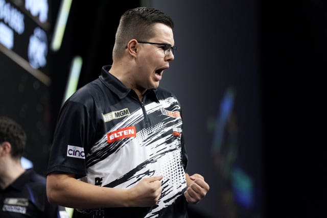 Gian van Veen celebrates defeating Luke Littler