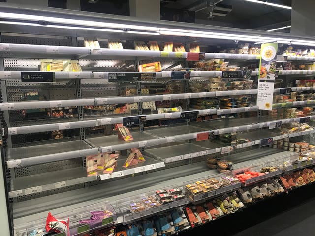 Depleted shelves in a Marks and Spencer store in Belfast 