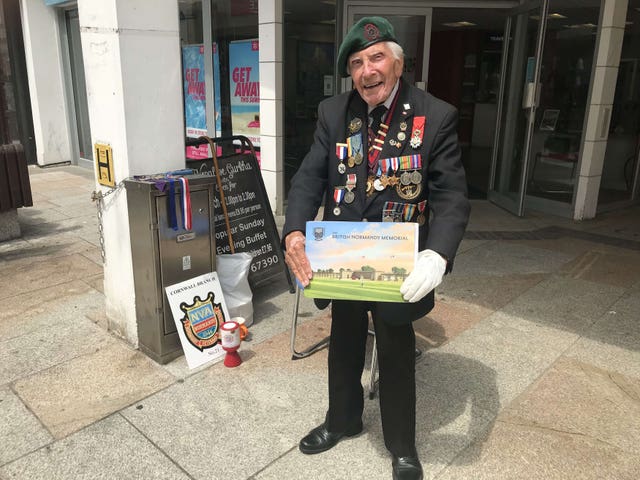 Harry Billinge fundraising in St Austell High Street in Cornwall 