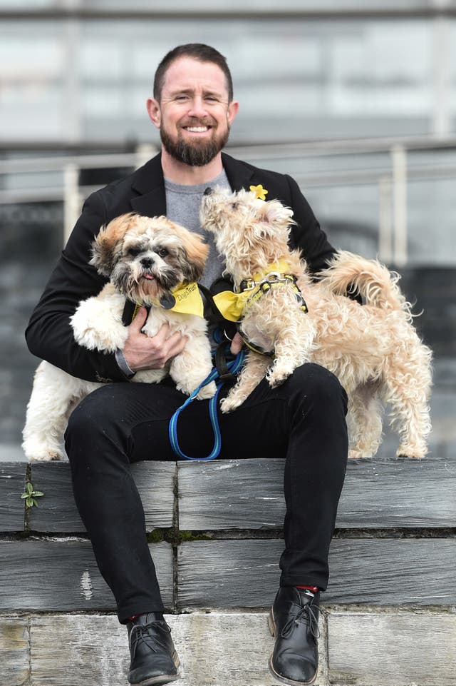 Rugby player Shane Williams with Coffee and Hercules (Ben Birchall/PA)