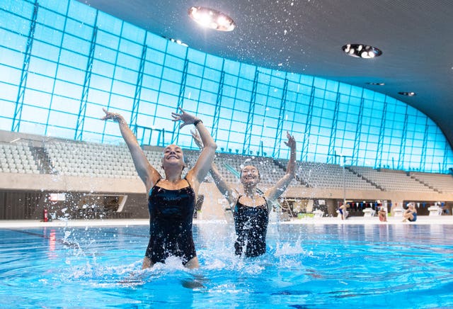 Members of Aquabatix synchronised swimming team Asha Randall (left) and Yixin Zeng make a splash at the centre 