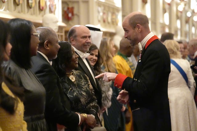 William chatting to guests during the Diplomatic Corps reception