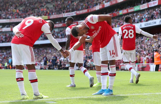 Arsenal’s Pierre-Emerick Aubameyang celebrates scoring his side’s second goal of the game with team-mate Alexandre Lacazette
