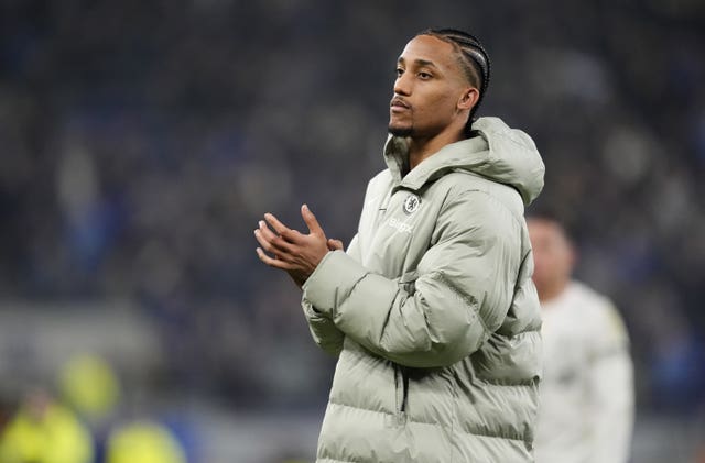 Joao Pedro applauds the Chelsea fans