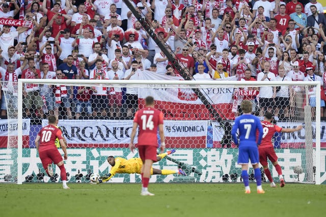 Lewandowski's first penalty was saved by Maignan