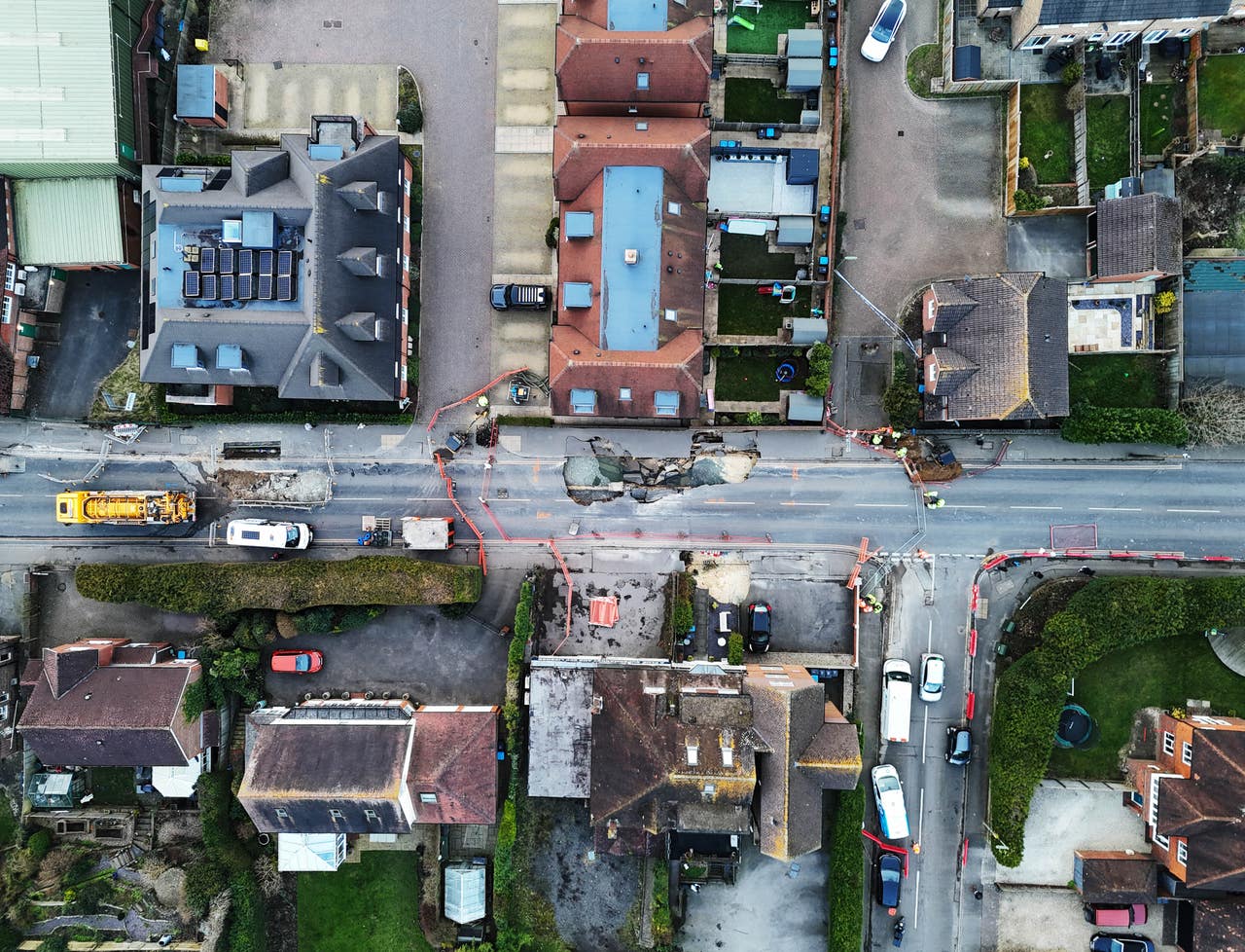 Couple plan to stay at home and ‘see what happens’ after giant sinkhole
