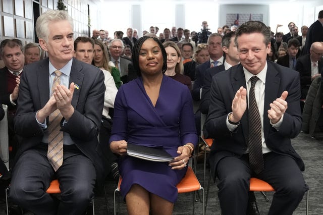 Left to right, James Cartlidge MP, Conservative Party leader Kemi Badenoch and Nigel Huddleston MP after Mrs Badenoch delivered a speech at Policy Exchange in Westminster, London 