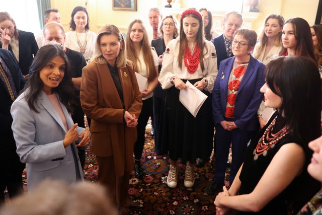 Prime Minister Rishi Sunak’s wife Akshata Murty (left) and the First Lady of Ukraine, Olena Zelenska, (second left) talk to singers from the Royal Opera House, the Royal Opera Chorus