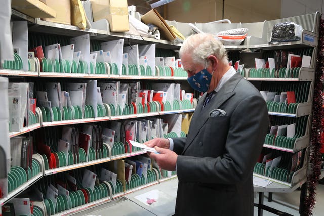 Charles found sorting the mail a little tricky at first. Geoff Caddick/PA Wire