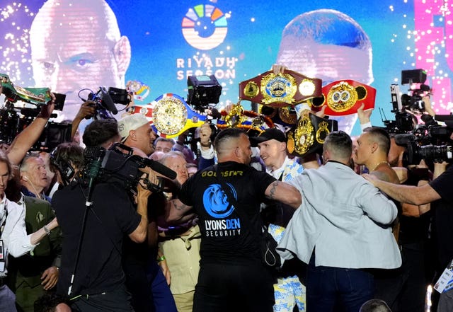 Tyson Fury and Oleksandr Usyk were pulled apart at the final face down