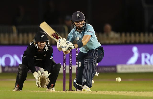 Heather Knight, right, sweeps against New Zealand