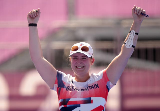 Great Britain’s Phoebe Paterson Pine celebrates winning gold at Tokyo 2020